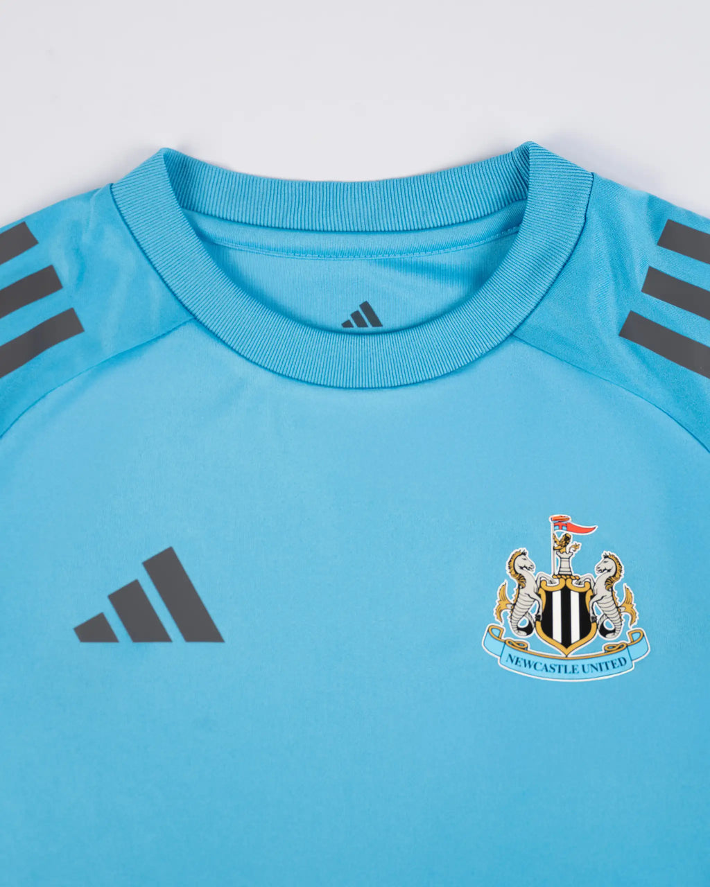 Newcastle United adidas 25/26 Players Range Kids' Blue Shirt