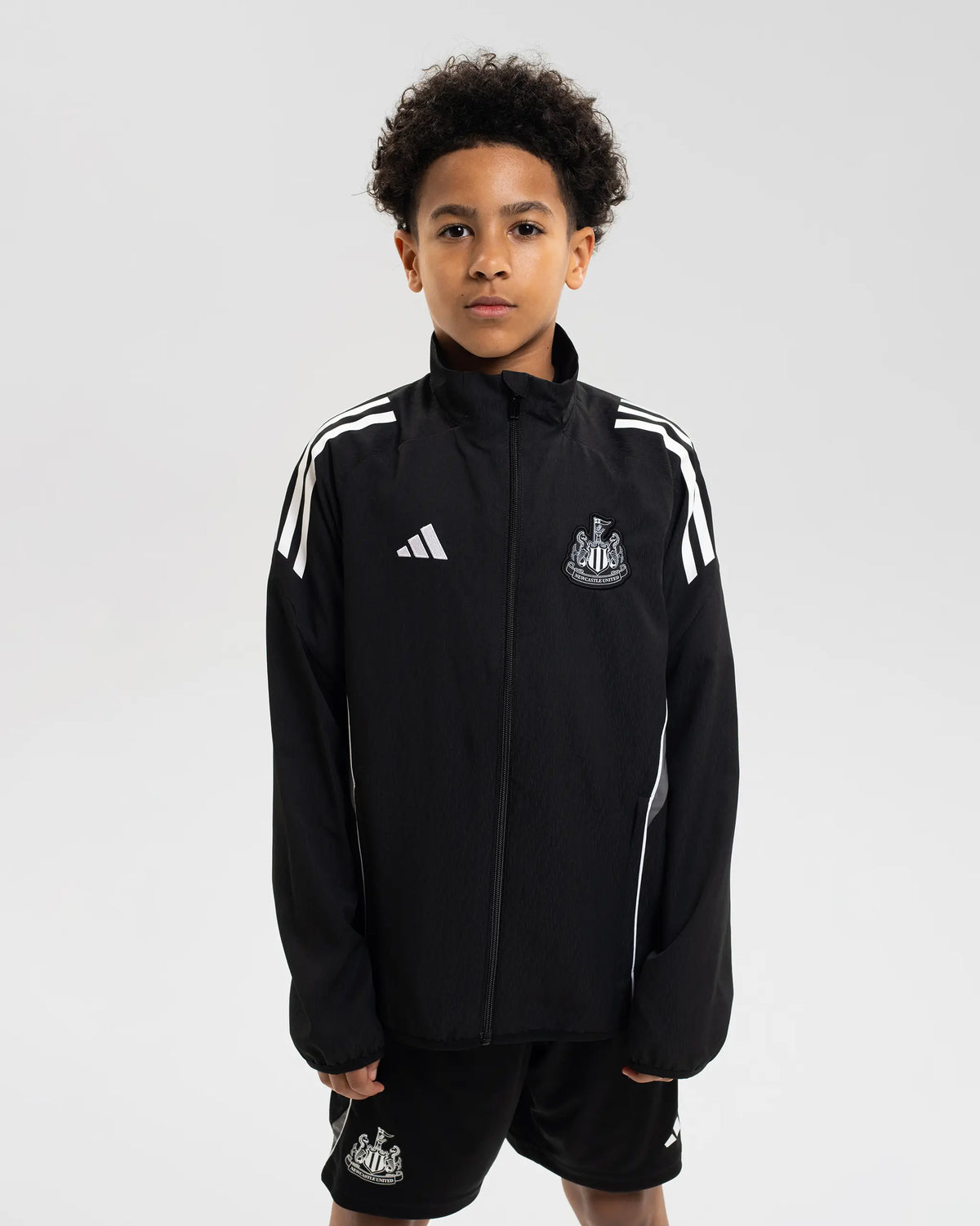 Newcastle United adidas 25/26 Coach's Black Edition Kids' Presentation Jacket