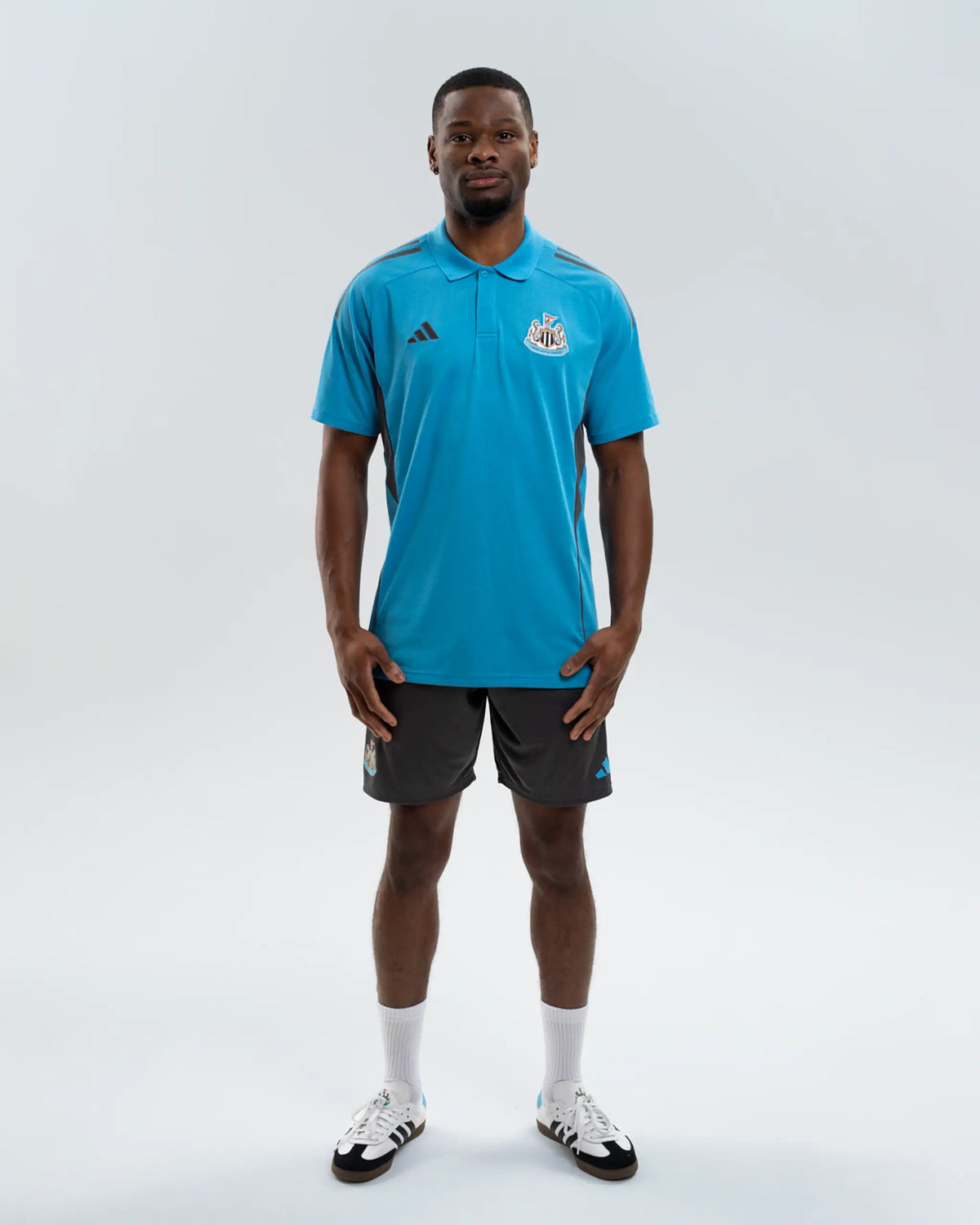 Newcastle United adidas 25/26 Players Range Blue Polo Shirt
