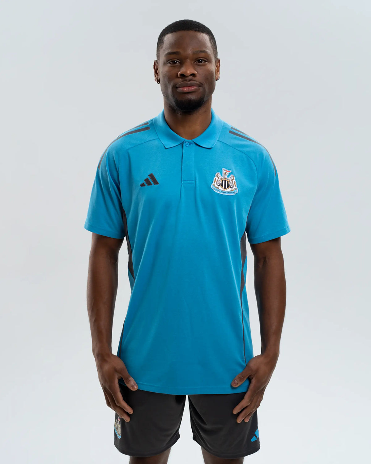 Newcastle United adidas 25/26 Players Range Blue Polo Shirt