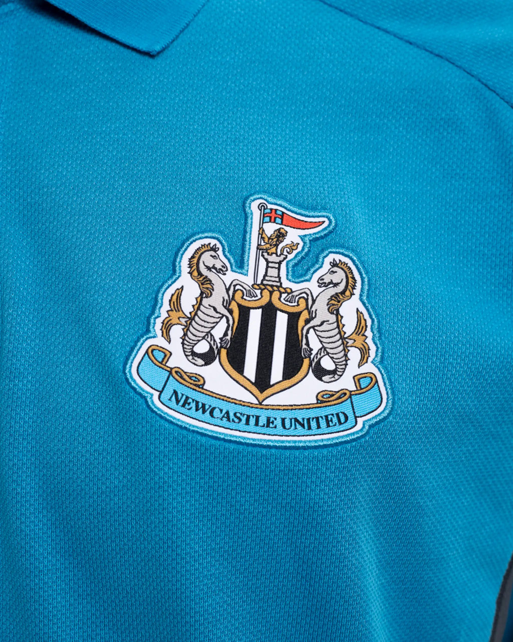 Newcastle United adidas 25/26 Players Range Blue Polo Shirt
