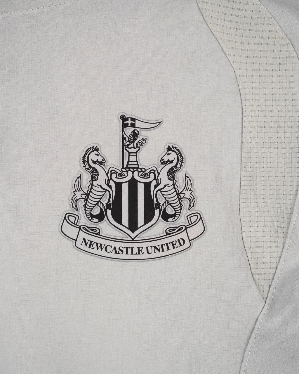 Newcastle United Kids' Alternative Tiro Travel Grey Windbreaker